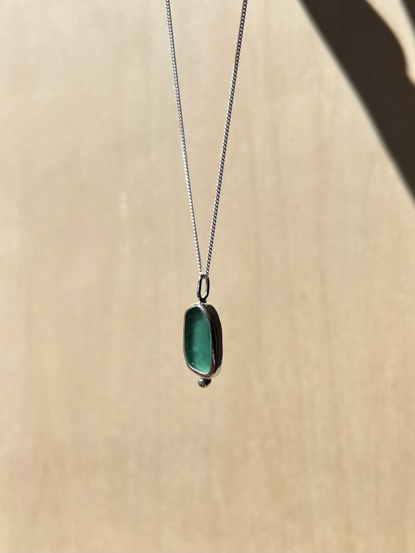 Petrol-colored Sea Glass Necklace in Silver
