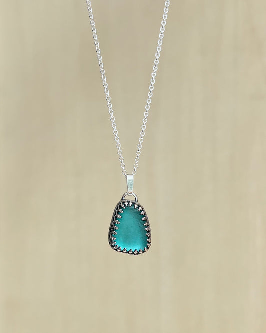Light blue sea glass necklace made of silver with embellishment