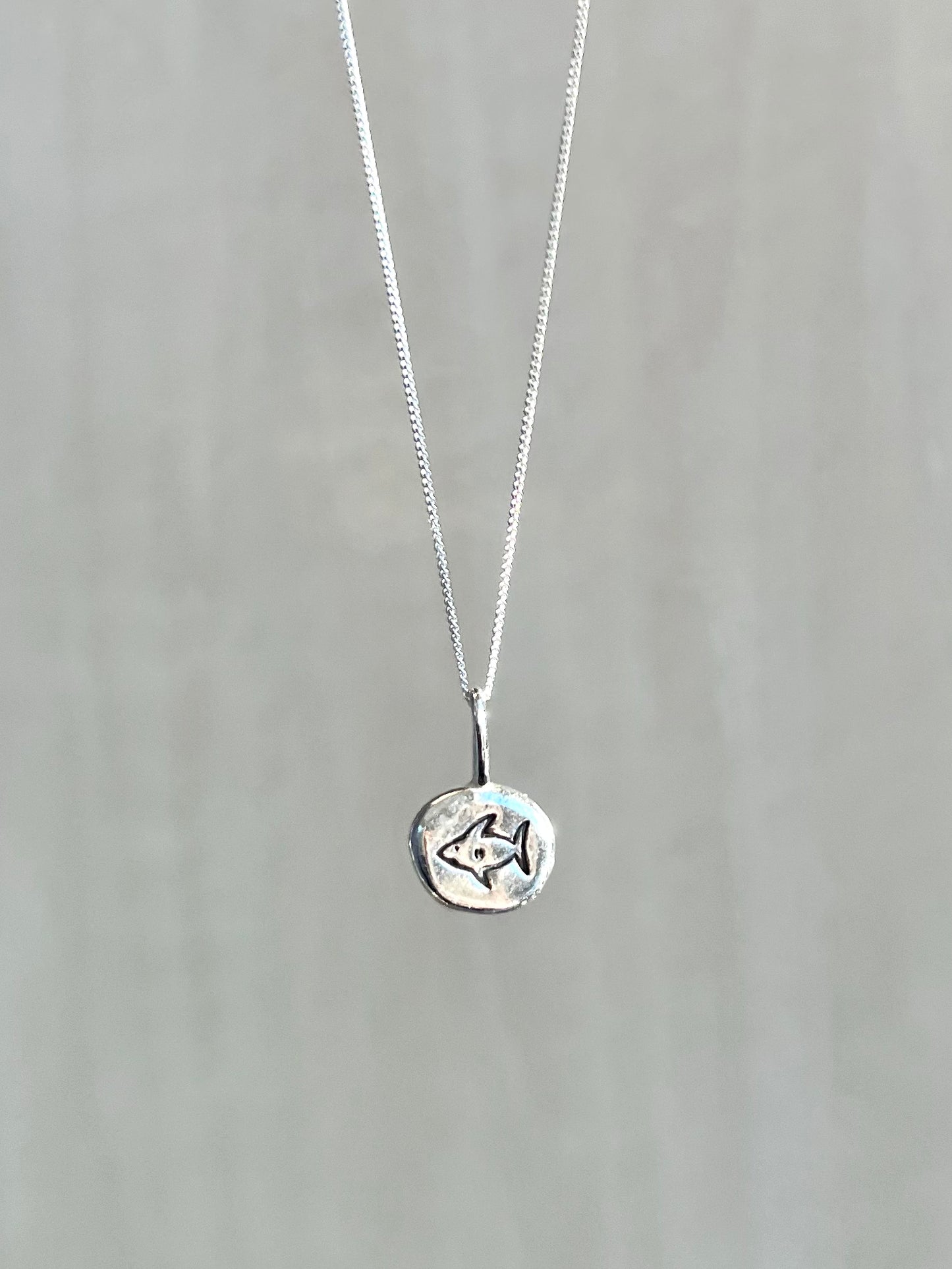 Shark necklace made from recycled silver