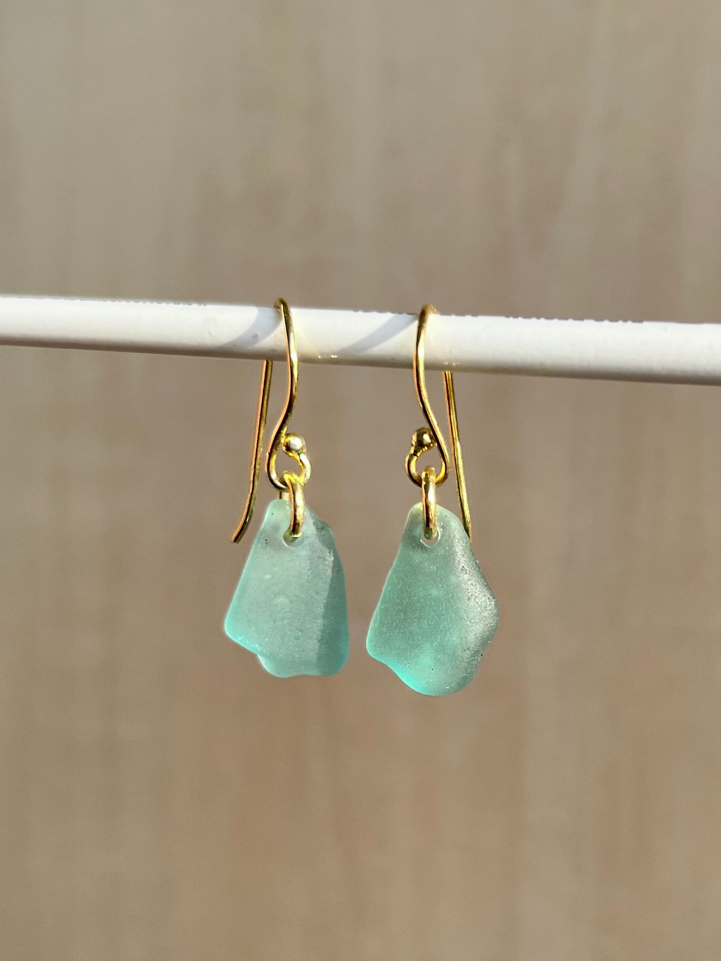 Light blue sea glass earrings (gold-plated silver)