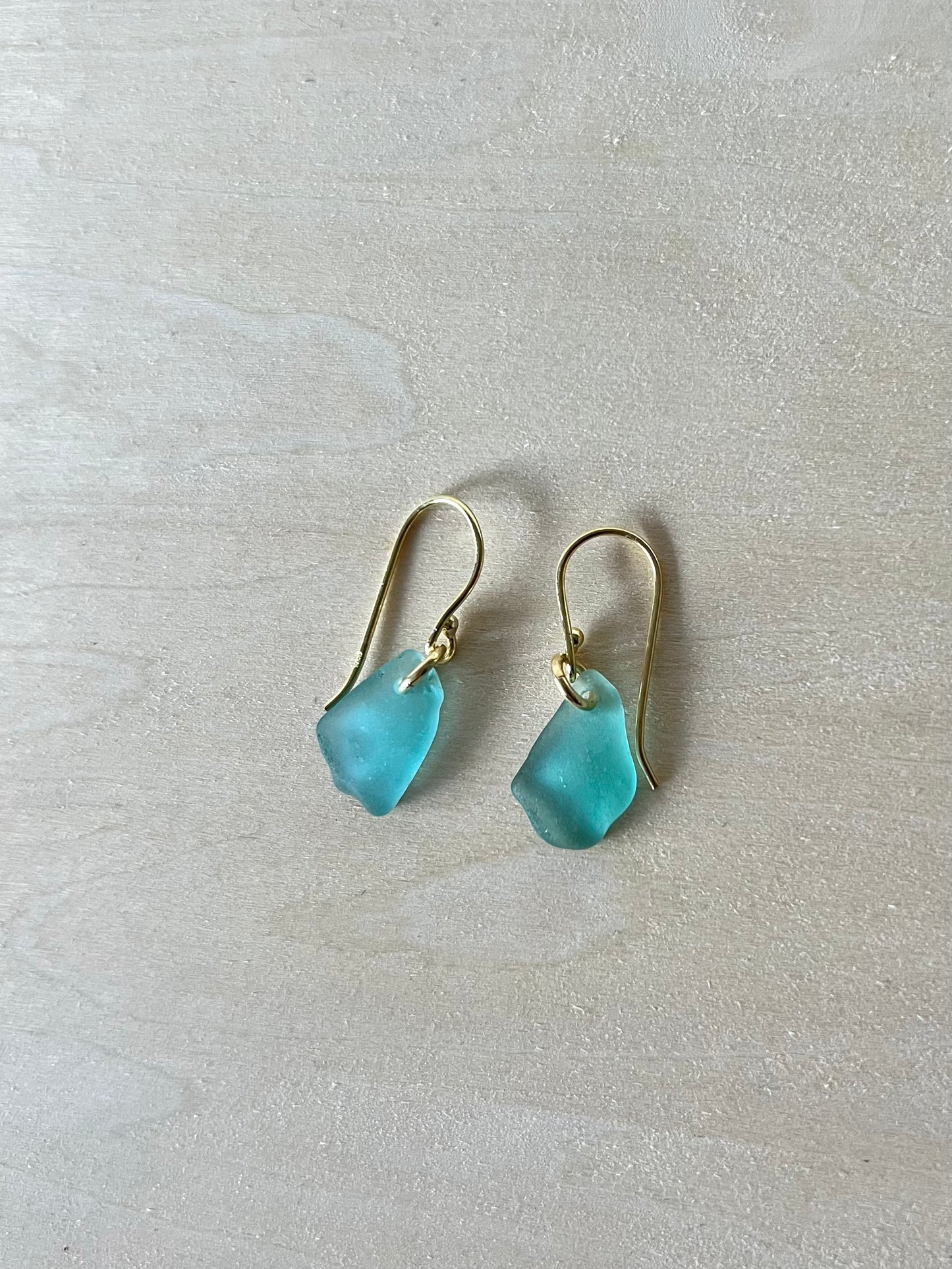 Light blue sea glass earrings (gold-plated silver)